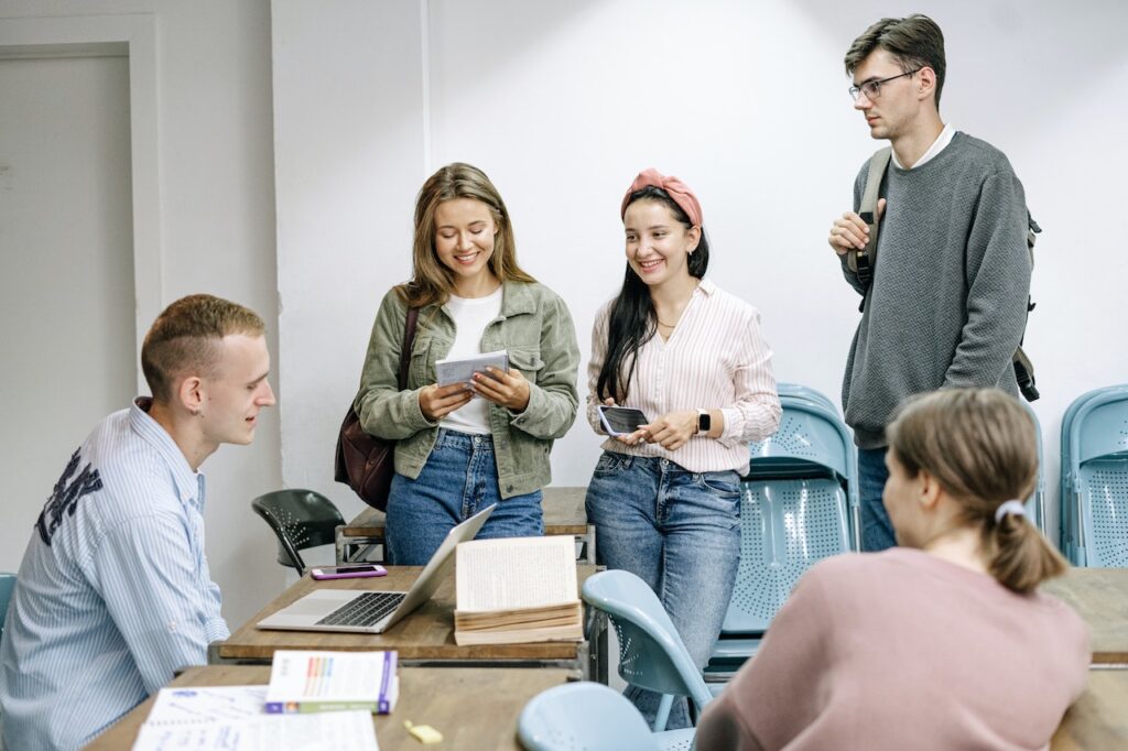 A group of people studying together in a classroom