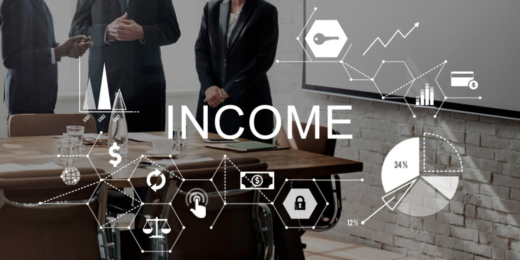 A word income and different graphics about money with three people standing on the background in a meeting room